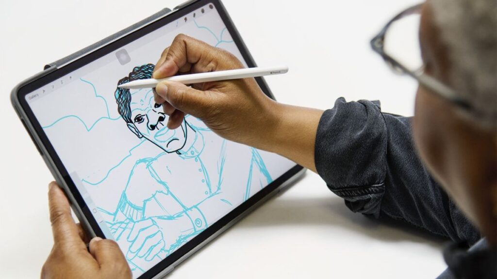 A person drawing on an iPad using an Apple Pencil 2.