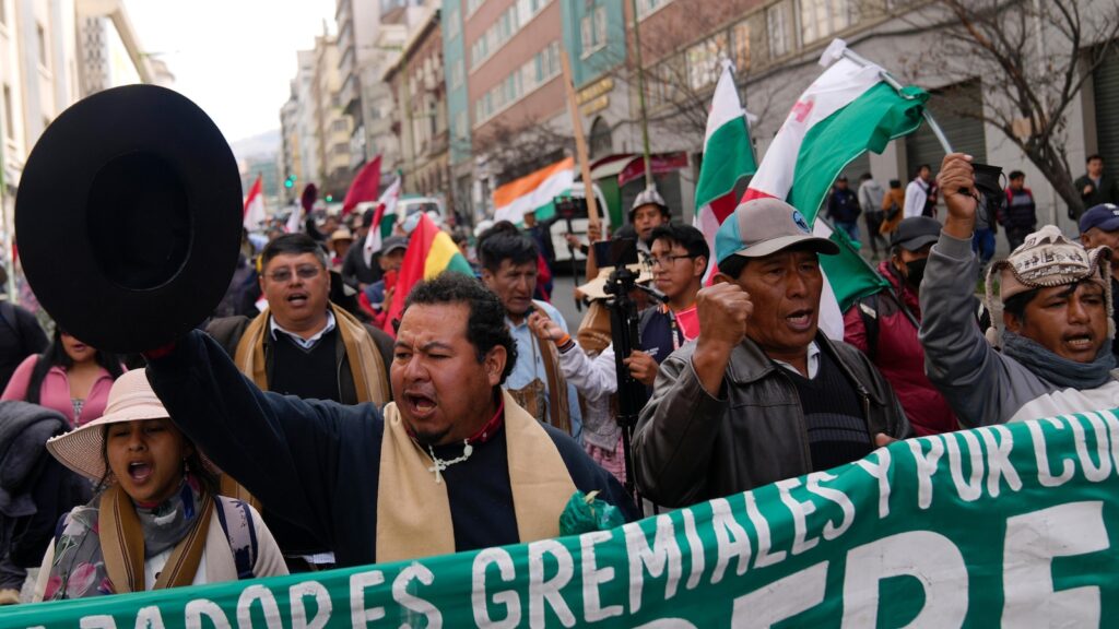 Bitter political fight in Bolivia is paralyzing the government as unrest boils over economic crisis