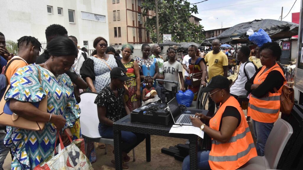 Ivory Coast sets up mobile enrollment for a health coverage program criticized over glitches