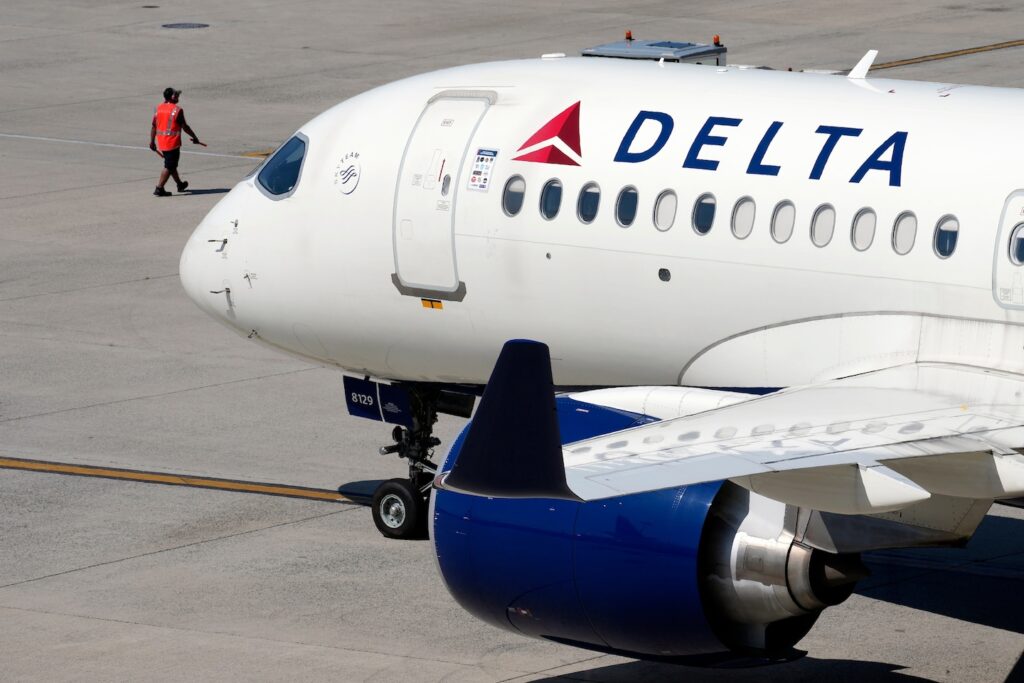 Delta cancels hundreds of flights as fallout from Microsoft outage continues