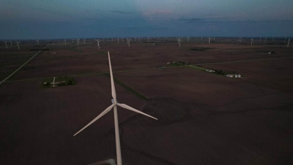 Wind farms' benefits to communities can be slow or complex, leading to opposition and misinformation