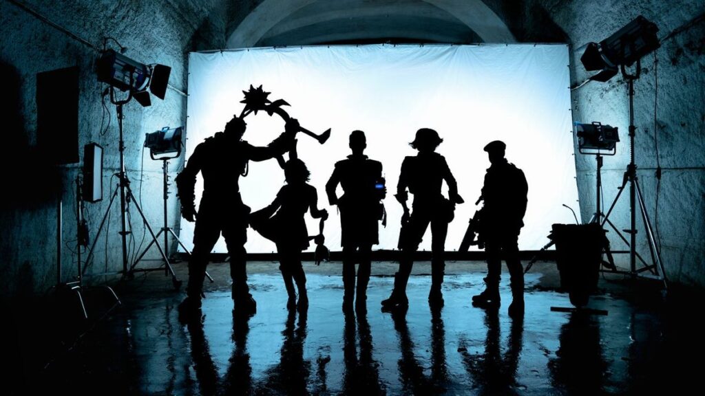 A silhouetted image of the main cast members in Lionsgate