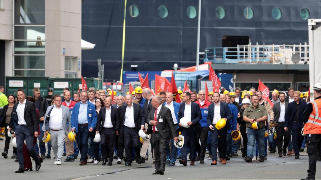 Germany's Scholz pledges that his government will help rescue a troubled cruise ship maker