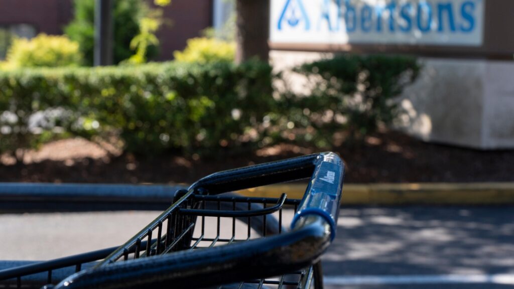 A state's experience with grocery chain mergers spurs a fight to stop Albertsons' deal with Kroger