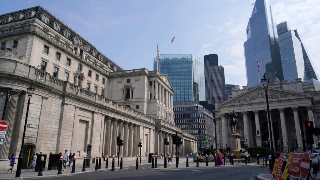 Bank of England keeps its main interest rate on hold at 5% in wake of big US Fed rate cut