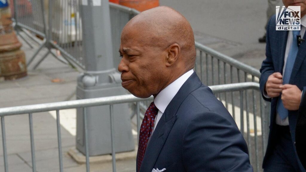 NYC Mayor Eric Adams arrives to turn himself in to face charges in federal corruption case