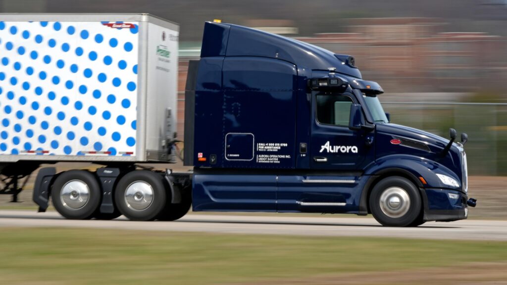 Autonomous truck company Aurora delays hauling freight without human drivers until April