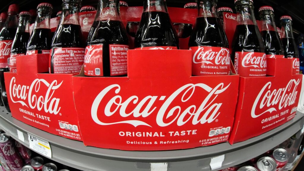 Coke's quarterly revenue and volumes fall but still beat expectations