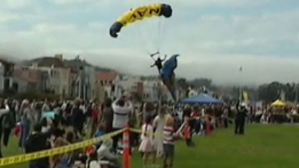 Navy parachutist crash-lands on mother and teenager during San Francisco performance: video