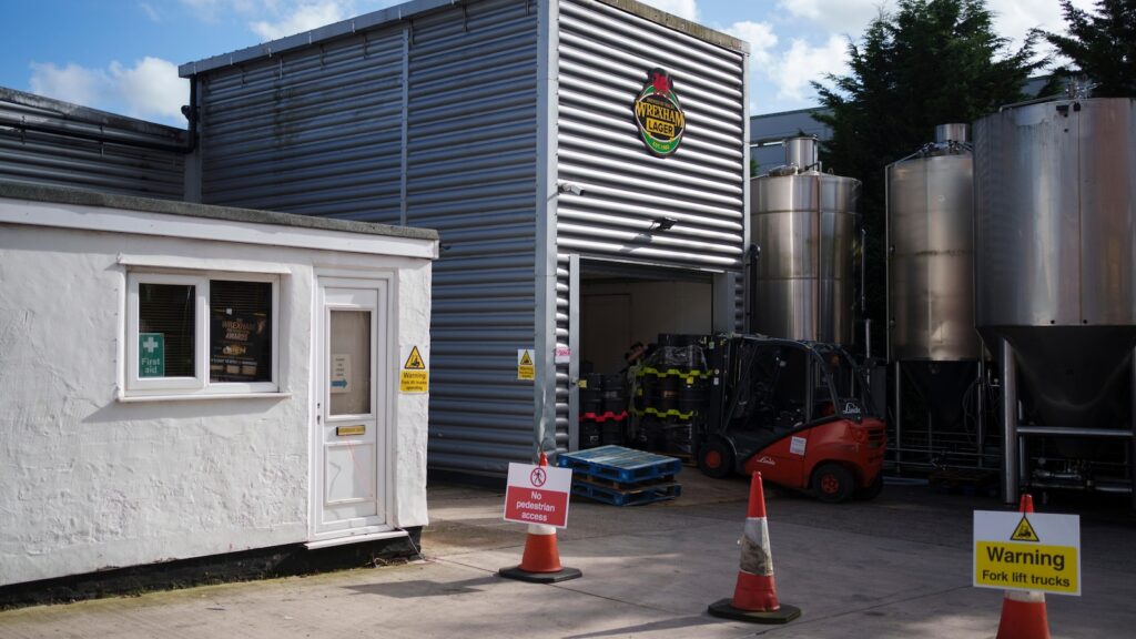 Reynolds and McElhenney buy Wrexham Lager brewery after rejuvenating the city's soccer team