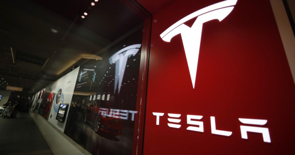 Tesla posts increase in deliveries but falls short of expectations