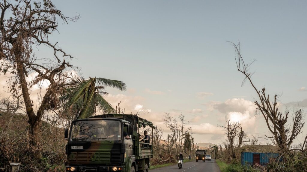 Crowds in Mayotte vent frustration with cyclone response as Macron tours devastation